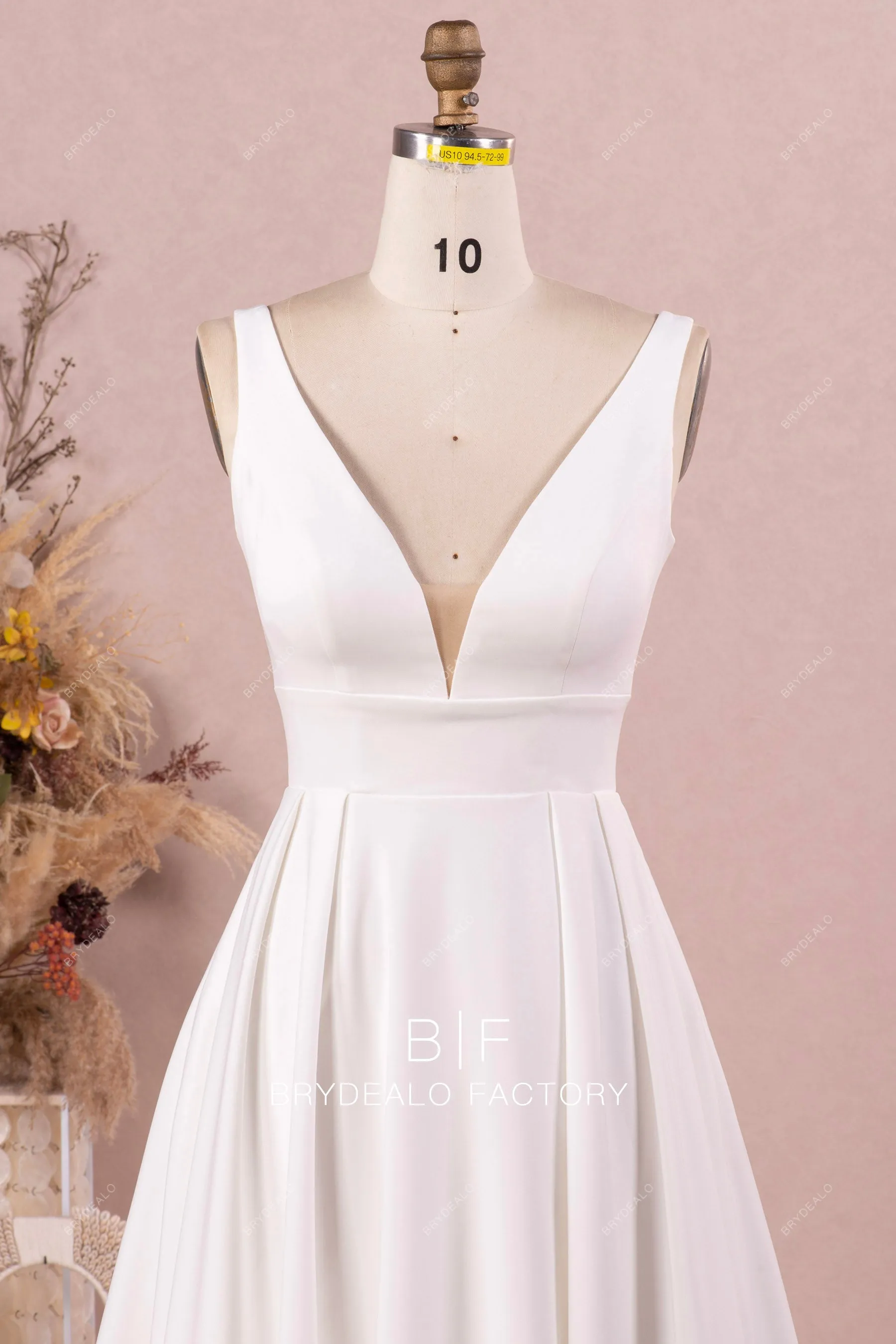 Elegant Sleeveless Plunging Neck Designer Crepe A-line Wedding Dress