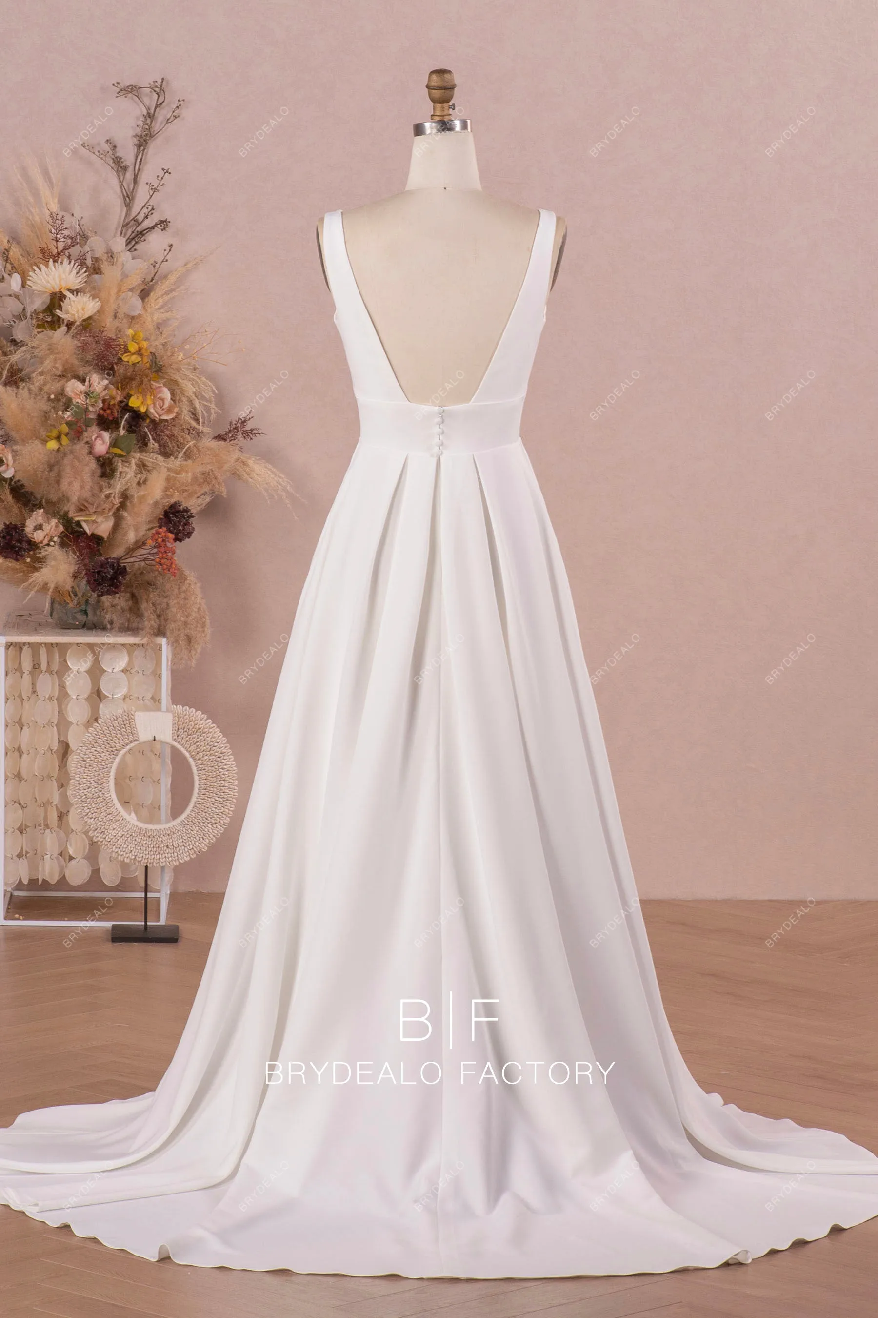 Elegant Sleeveless Plunging Neck Designer Crepe A-line Wedding Dress